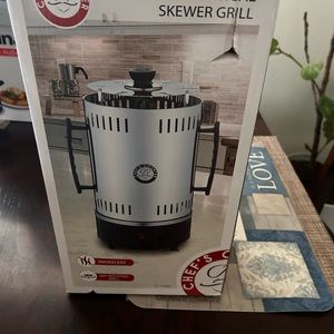 Electrical skewer grill brand new